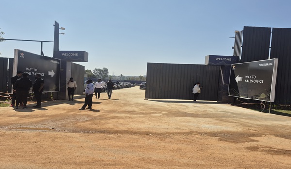 Construction progress view of Site Office building with scaffolds at Purva Northern Lights